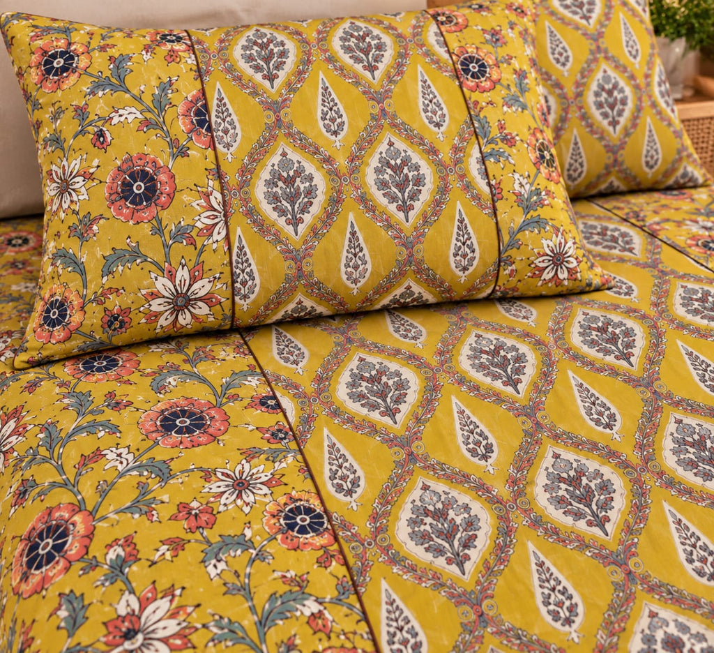 ChapaSsyahii Ajrakh Mix and Match Bedsheet Set - Navy Rose Floral, styled on bed
