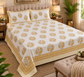 Mustard Rose Bouquet Handblock Cotton Super King Bedsheet on bed with pillow covers